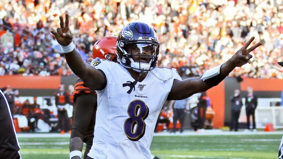 Lamar Jackson celebrates first seed a touchdown against the Cleveland Browns.