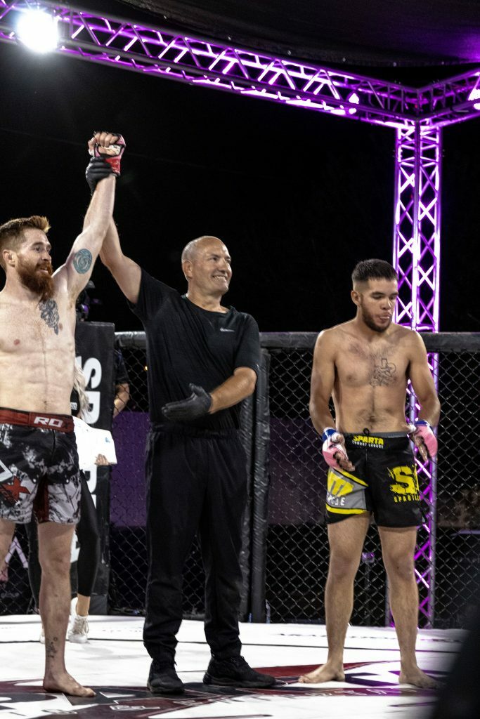 Zac Haynes getting his hand raised. Photo credit Ashlee Moreno.