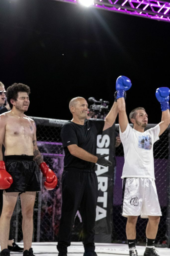 Steven Lontine getting his hand raised. Photo credit Ashlee Moreno.