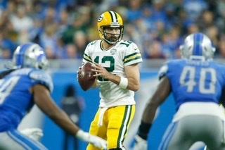 Aaron Rodgers drops back to throw a pass against the Detroit Lions. Rodgers posted a passer rating of 72.0 on Sunday.