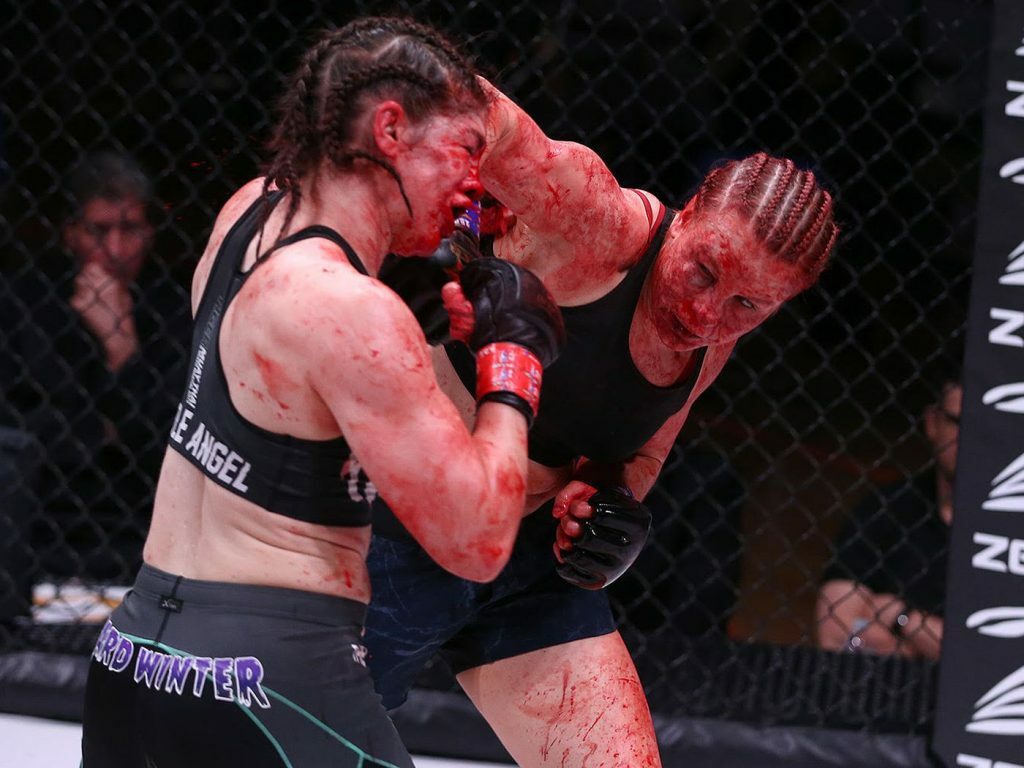 Stoliarenko landing a punch on Versoza.