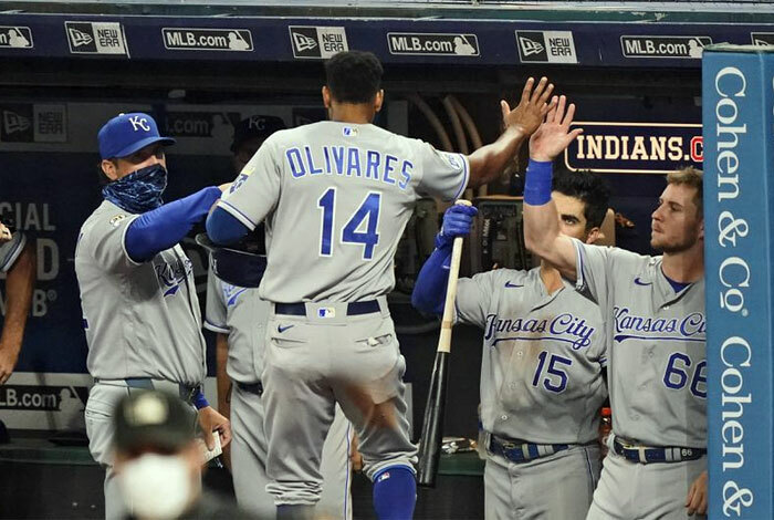 Edward Olivares high fiving teammates.