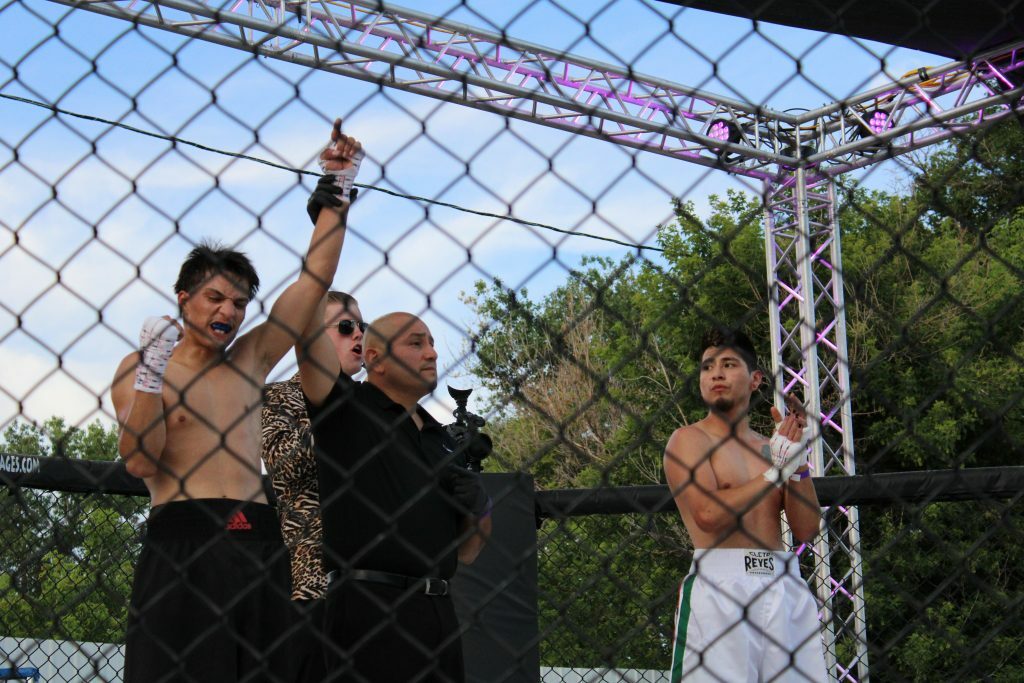 Sparta Wyoming match 1 winner Jesus Carrillo getting his hand raised. Photo Credit Ashlee Moreno.