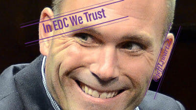 Photo of Eric DeCosta with "In EDC We Trust" in text