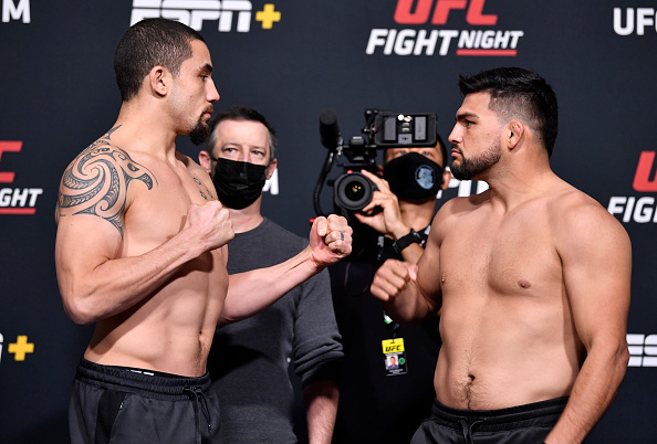 Kelvin Gastelum taking down Ian Heinisch. UFC 258 takeaways