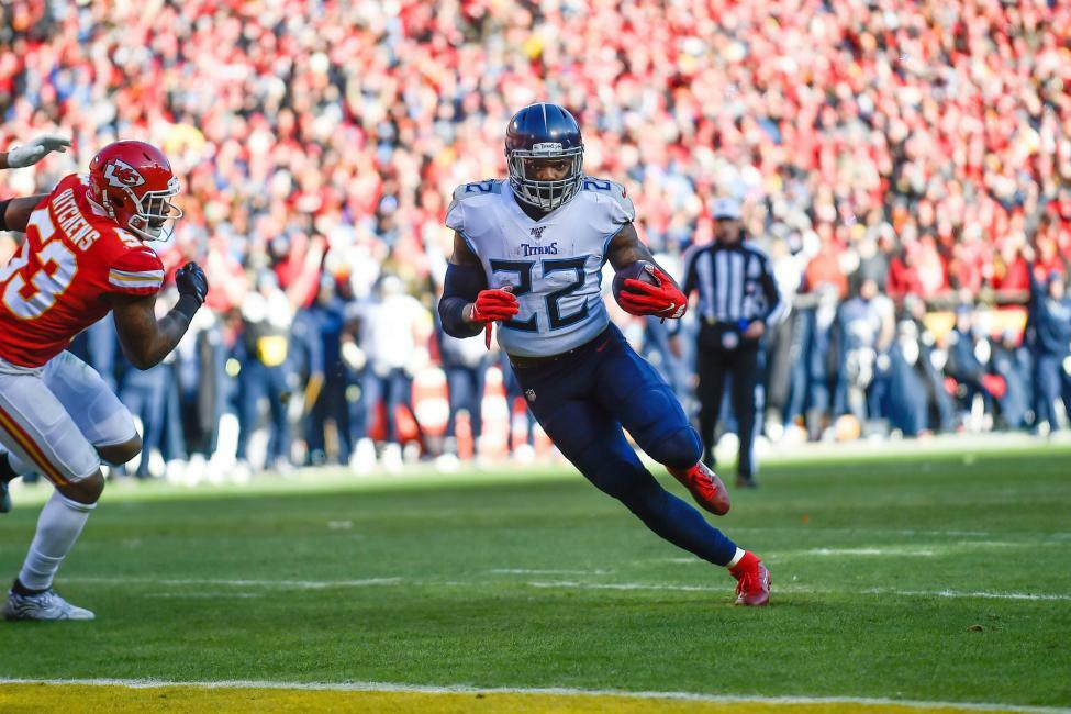 Derrick Henry runs during the Titans playoff game versus Kansas City.