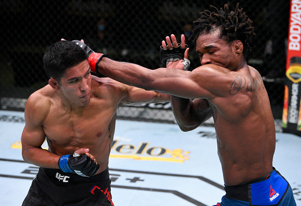 Vince Cachero punches Jamall Emmers.