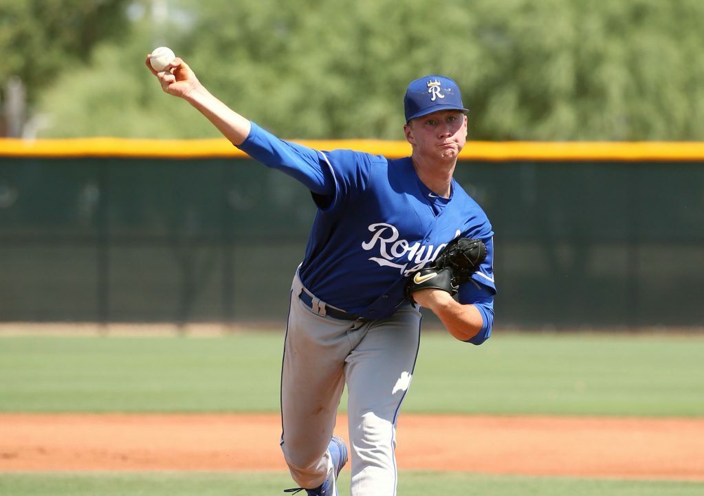 Brady Singer pitching during Spring Training game. 