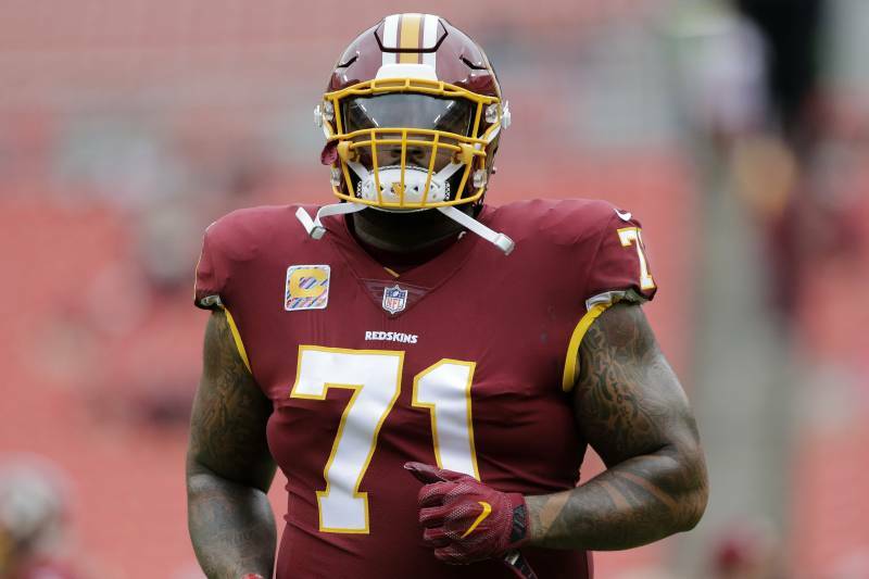 Trent Williams holdout in red uniform wear 71.