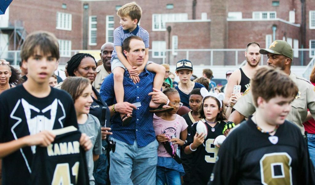 Drew Brees at Charity event
New Orleans Divide
