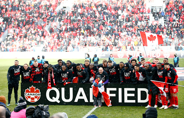 The Canadian Men's National Team celebrate after qualifying for the 2022 World Cup.