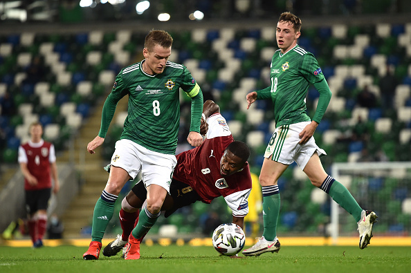 Steven Davis battling with David Alaba in International Match for Northern Ireland.