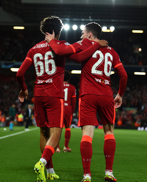 Trent Alexander-Arnold celebrates the first goal in Liverpool's Champions League opener vs AC Milan.