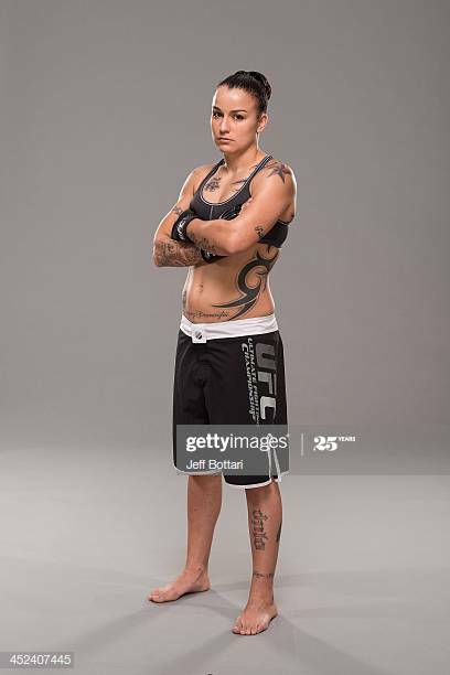 Raquel Pennington standing with arms crossed.