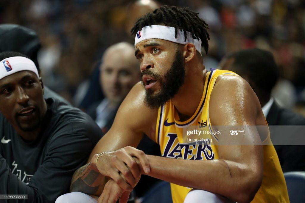 JaVale McGee watches during a preseason game.