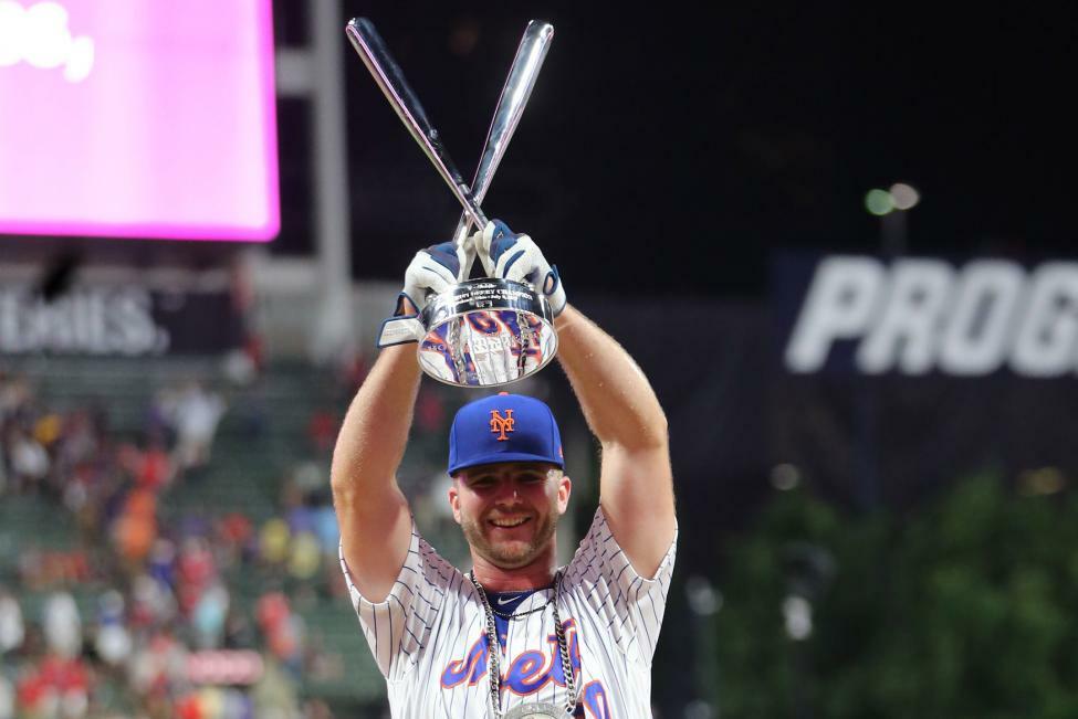 Alonso holds trophy after winning HR derby
